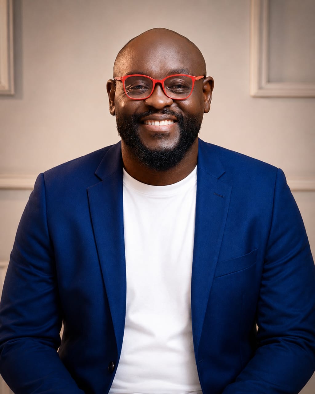 Portrait of Dr Jean-Louis Ntang, Founder and Managing Director of VIBE Consulting SARLU, operating under the brand VIBE UXML.